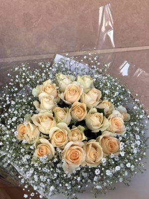 20 Sweet Peach Roses Wrapped with Baby Breath